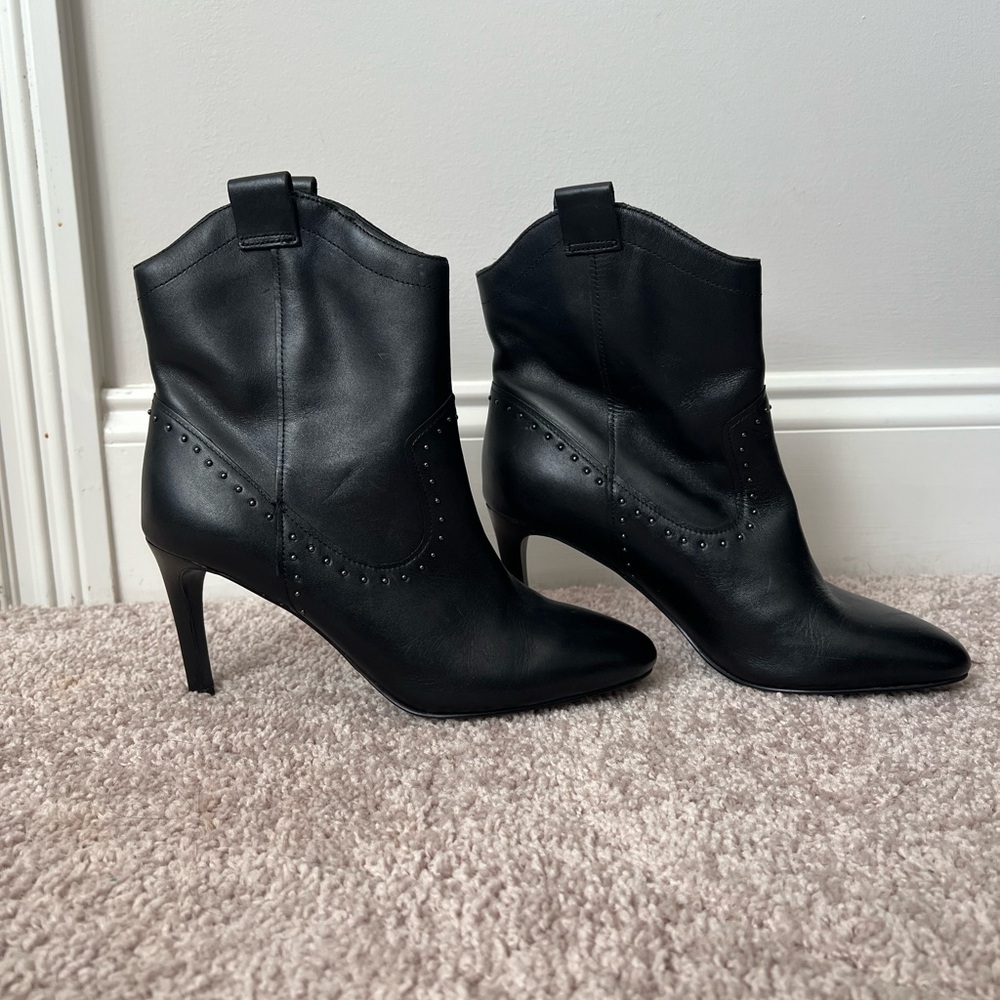 Black leather cowboy booties with a 3 inch heel